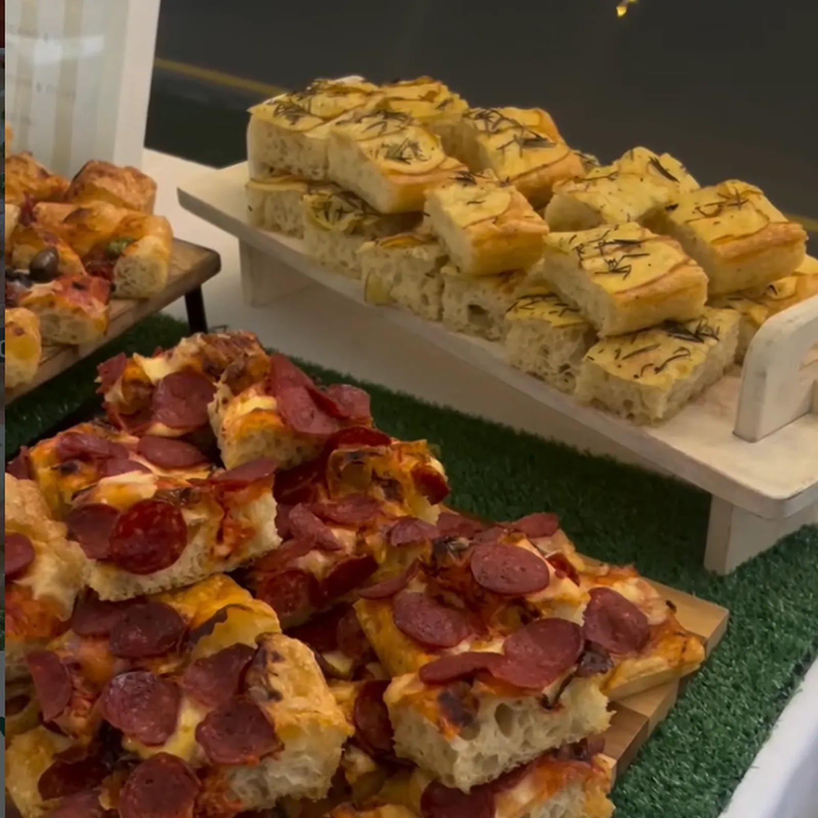 Catering trays of focaccia ready for a service table